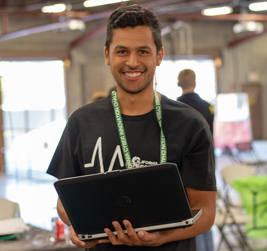 Marco Zuniga with laptop