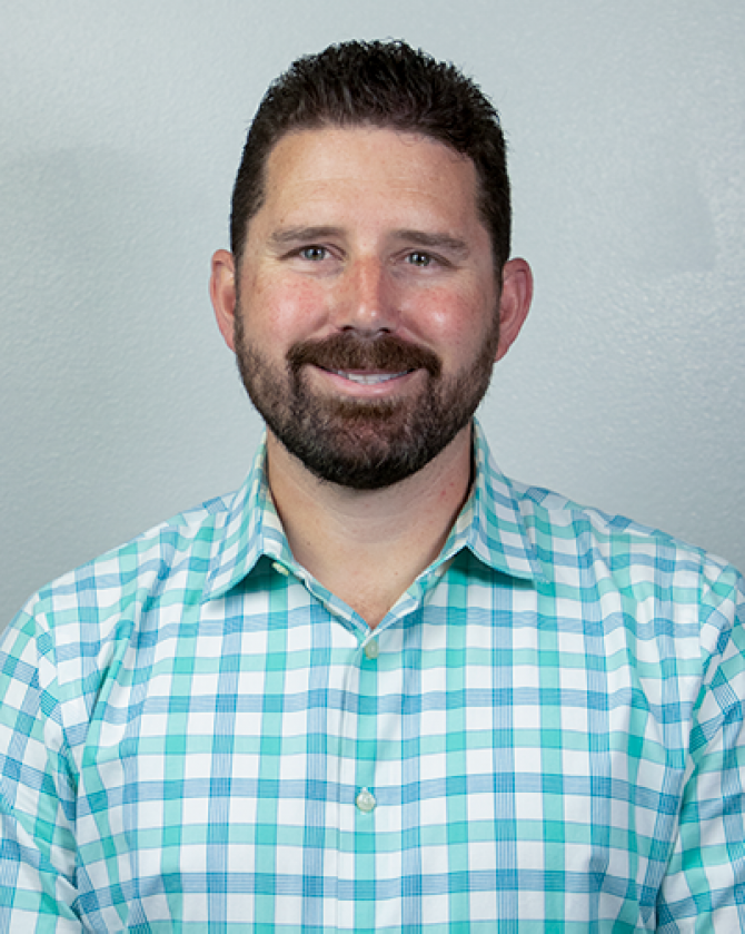 matt timmer wearing a blue gingham shirt
