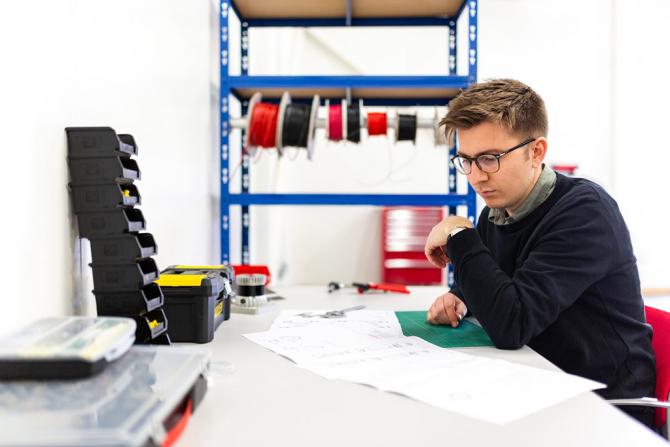 Young man working at a desk