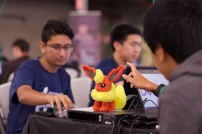 A Flareon Pokémon helping a 2017 CCIC team