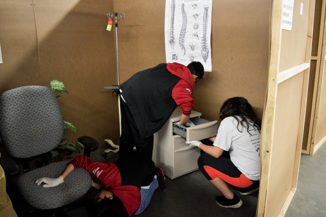 CCIC 2018 participants looking for evidence in a medical set